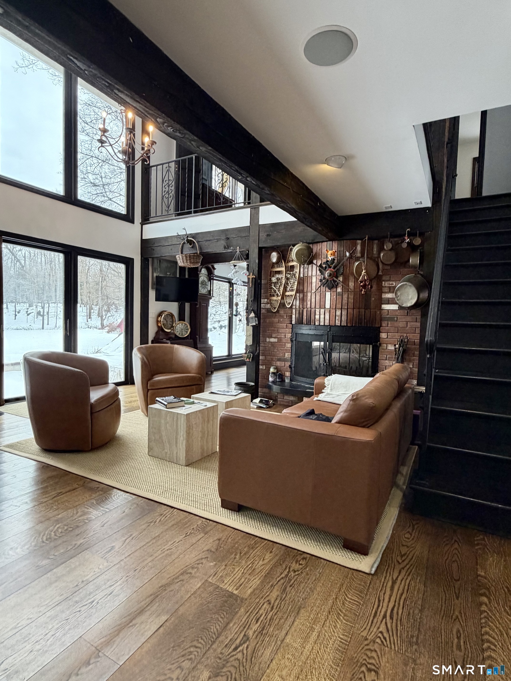 488 Cognewaugh Road Greenwich, CT 06807 - Photo 19 of 40 a living room with furniture and a large window