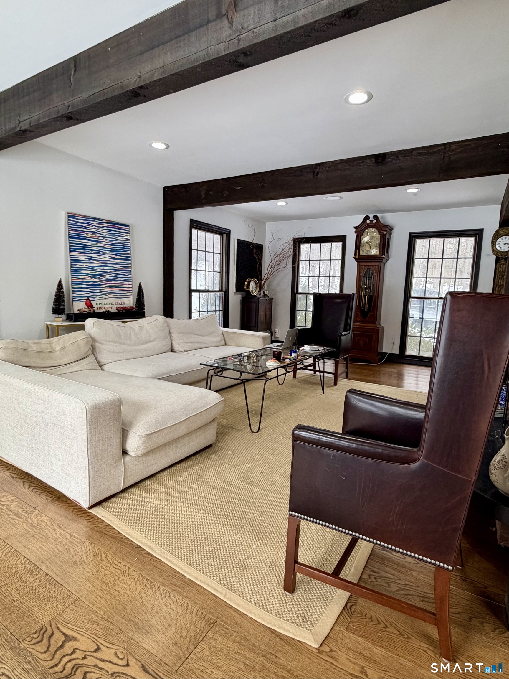 488 Cognewaugh Road Greenwich, CT 06807 - Photo 22 of 40 a bedroom with a bed a couch and dresser