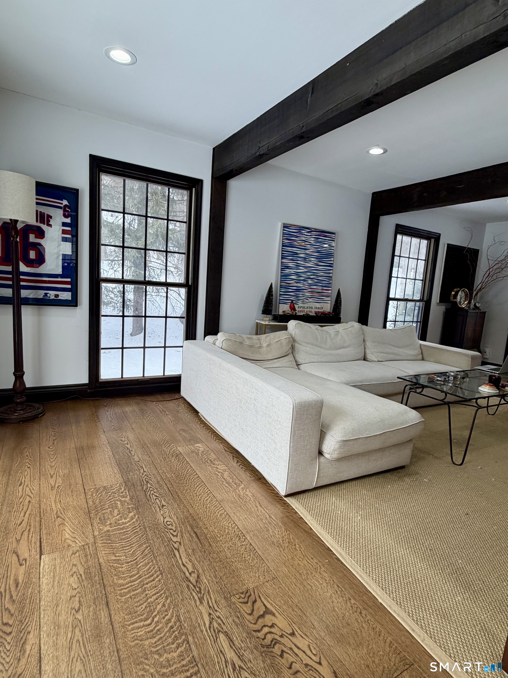 488 Cognewaugh Road Greenwich, CT 06807 - Photo 23 of 40 a spacious bedroom with a large bed and a window