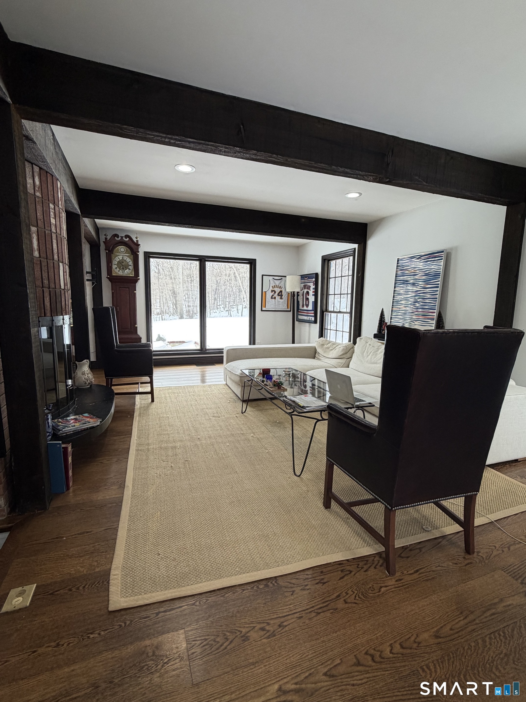 488 Cognewaugh Road Greenwich, CT 06807 - Photo 24 of 40 a living room with furniture and a large window