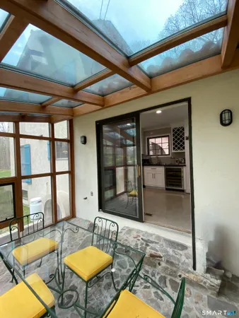 a living room with furniture and a table