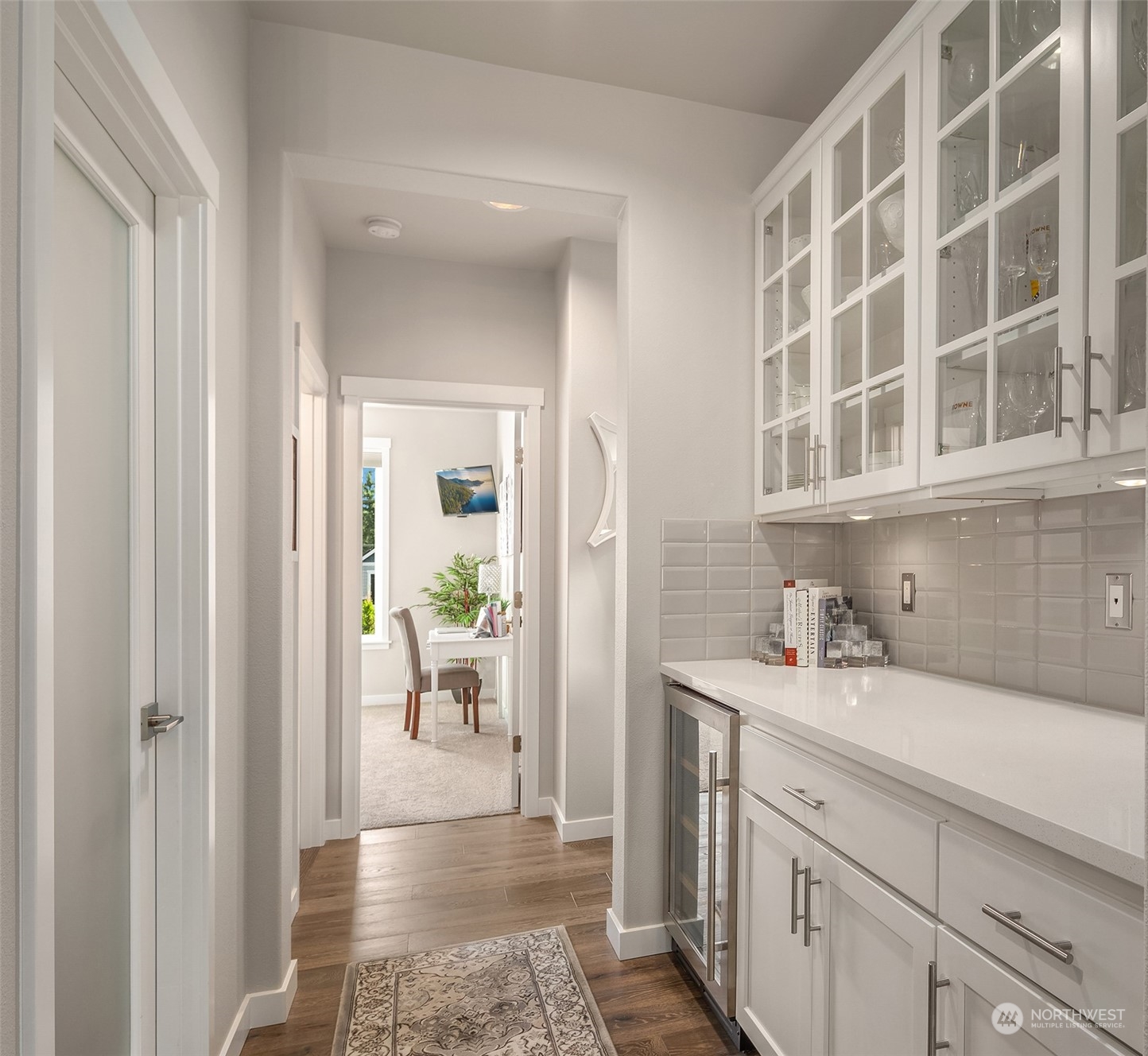 4331 Caddyshack Drive Northeast Lacey, WA 98516 - Photo 15 of 34 a hallway with a view of living room and wooden floor