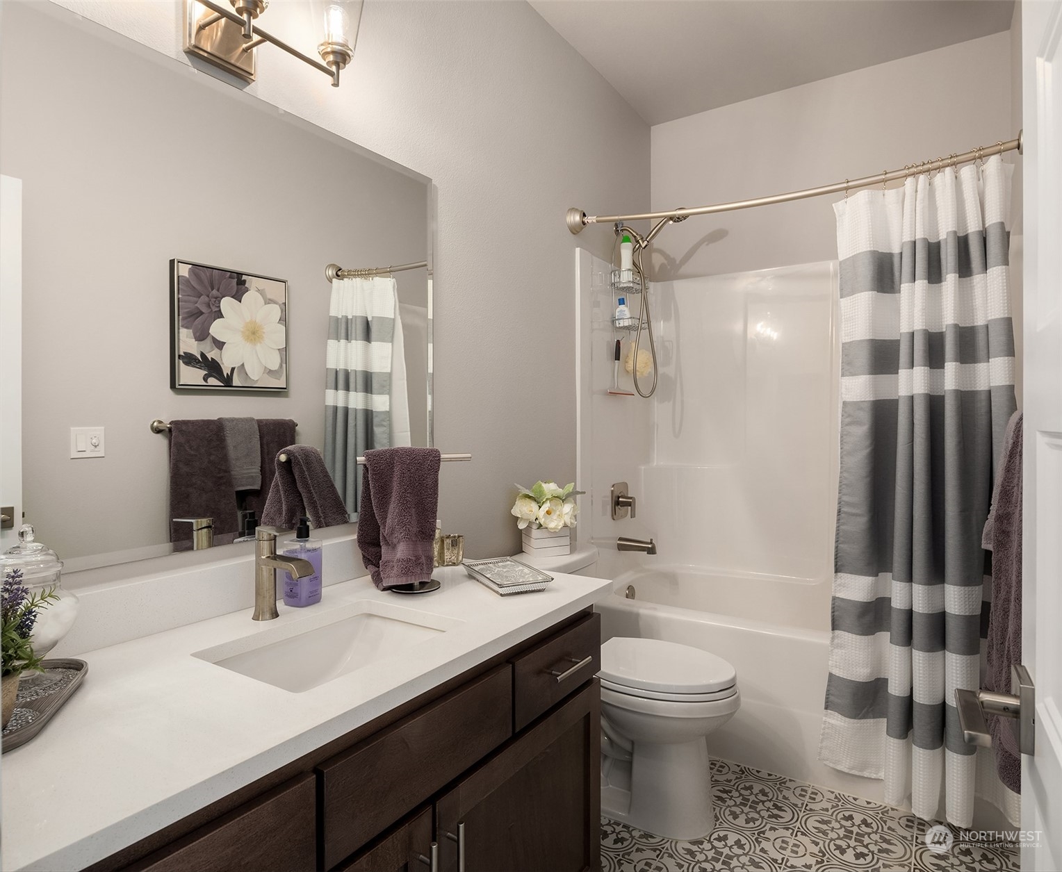 4331 Caddyshack Drive Northeast Lacey, WA 98516 - Photo 17 of 34 a bathroom with a sink a toilet and shower
