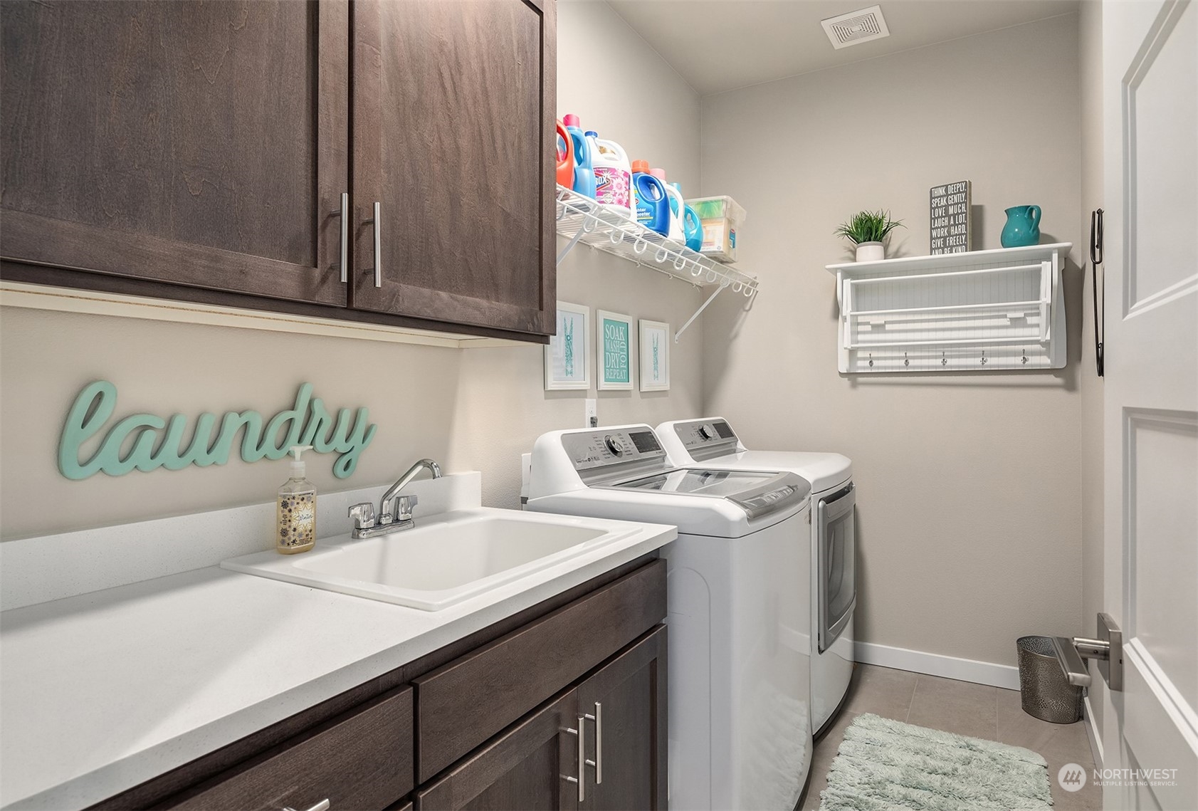 4331 Caddyshack Drive Northeast Lacey, WA 98516 - Photo 19 of 34 a bathroom with a sink and a mirror