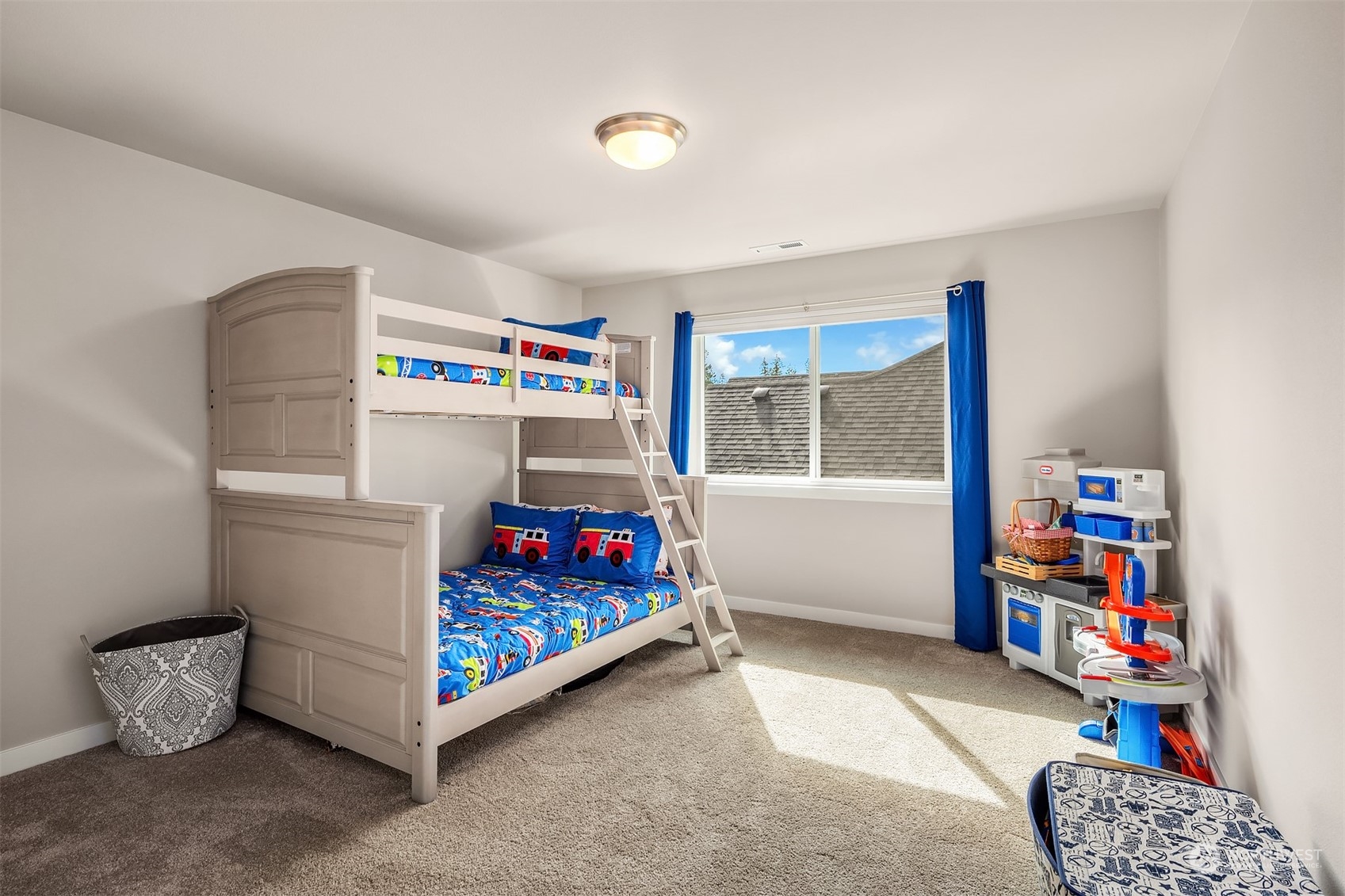 4331 Caddyshack Drive Northeast Lacey, WA 98516 - Photo 27 of 34 a bedroom with furniture and a book shelf