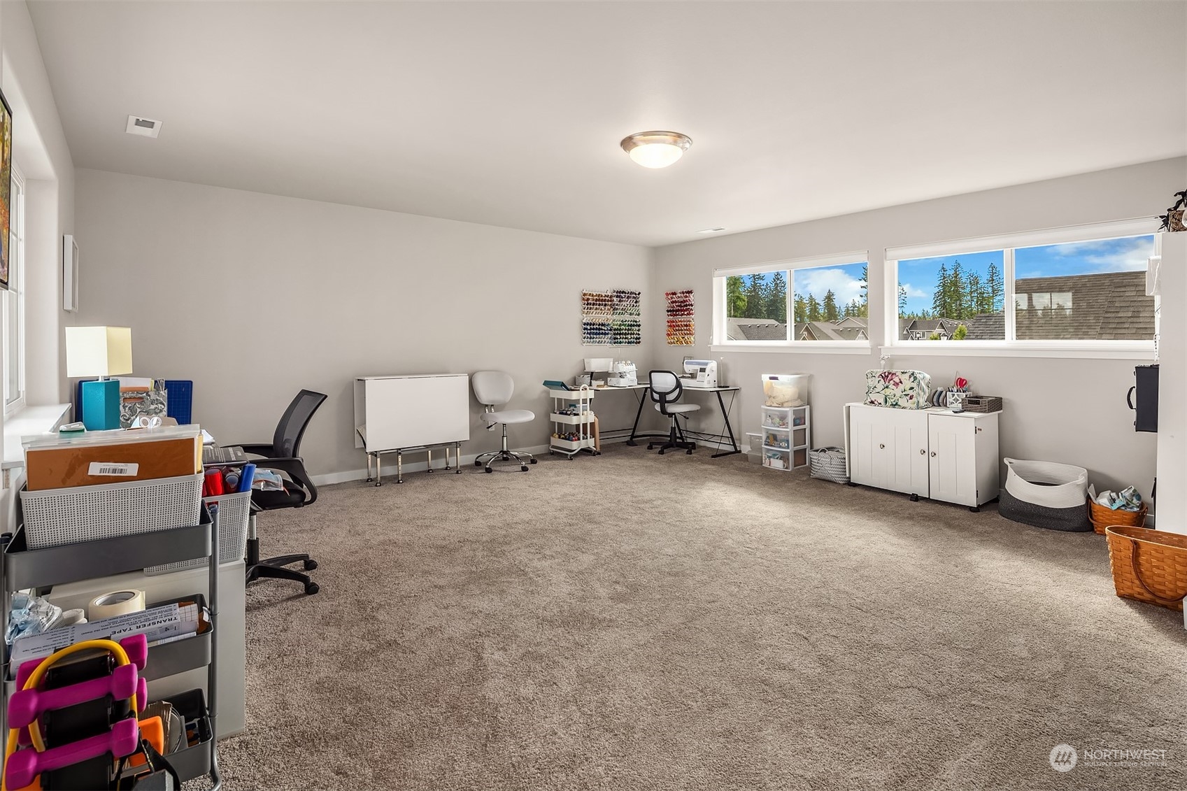 4331 Caddyshack Drive Northeast Lacey, WA 98516 - Photo 28 of 34 a room with furniture and a window