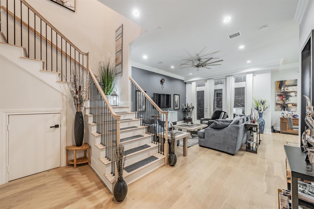 7333 Valley View Lane, Unit 902 Dallas, TX 75240 - Photo 14 of 40 a living room with lots of furniture and wooden floor