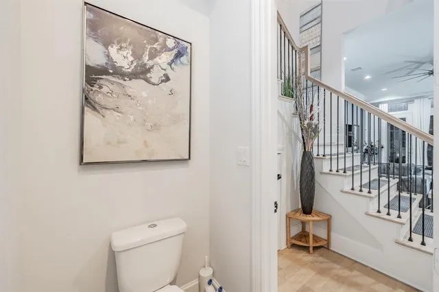 a spacious bathroom with a shower sink and mirror