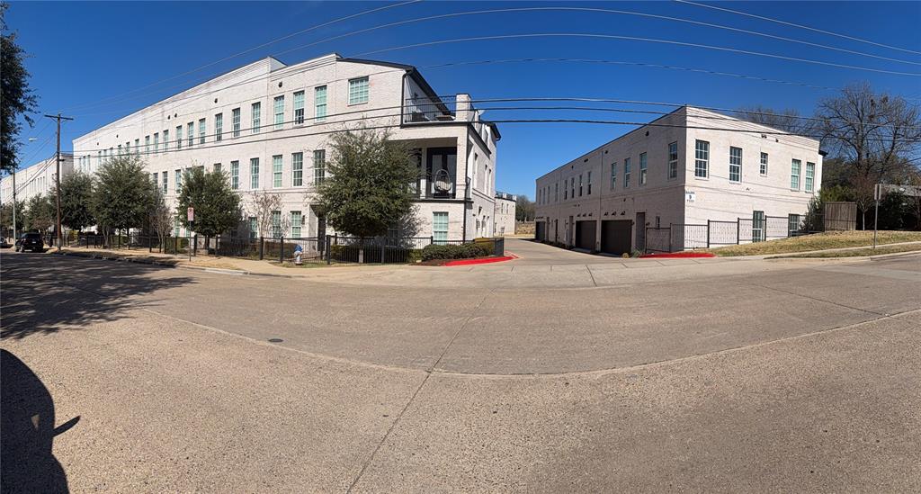 7333 Valley View Lane, Unit 902 Dallas, TX 75240 - Photo 40 of 40 a view of a building with a street