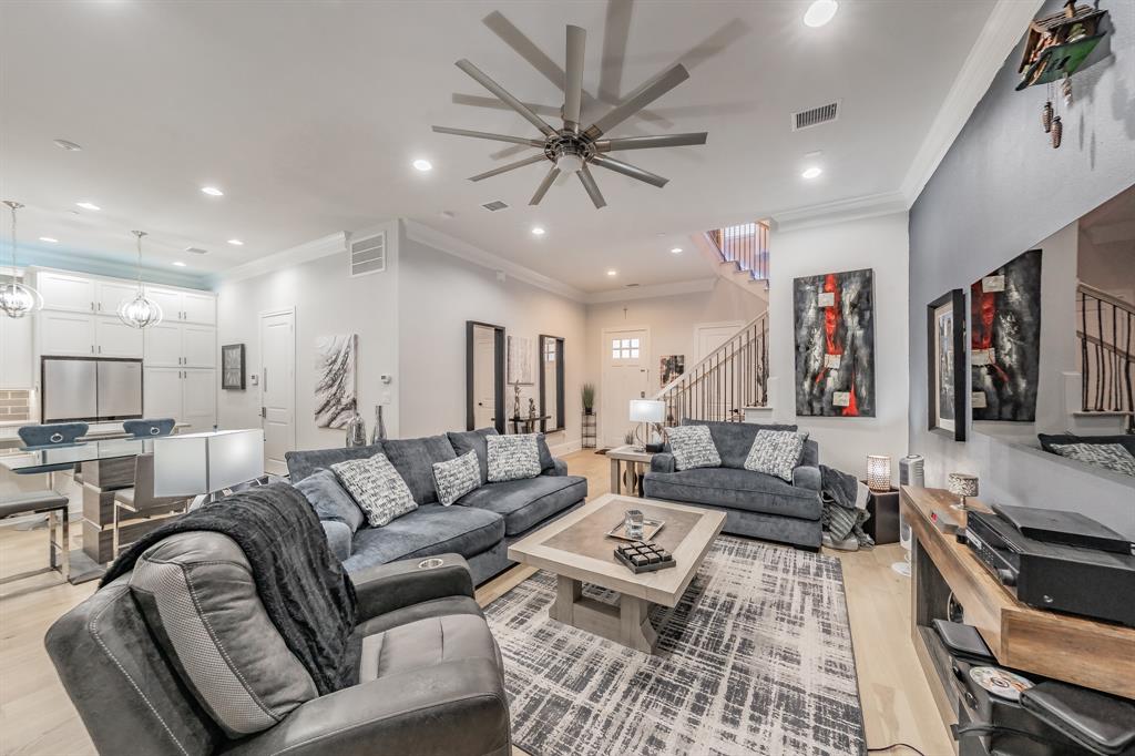 7333 Valley View Lane, Unit 902 Dallas, TX 75240 - Photo 5 of 40 a living room with furniture kitchen view and a large window