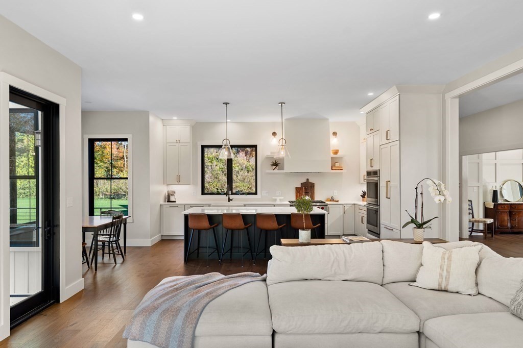 35 Hitching Post Road North Andover, MA 01845 - Photo 15 of 42 a living room with furniture a large window and white appliances