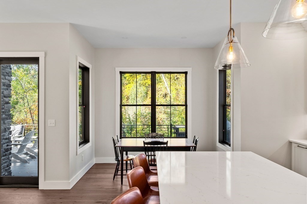 35 Hitching Post Road North Andover, MA 01845 - Photo 18 of 42 a view of a room with a window and wooden floor