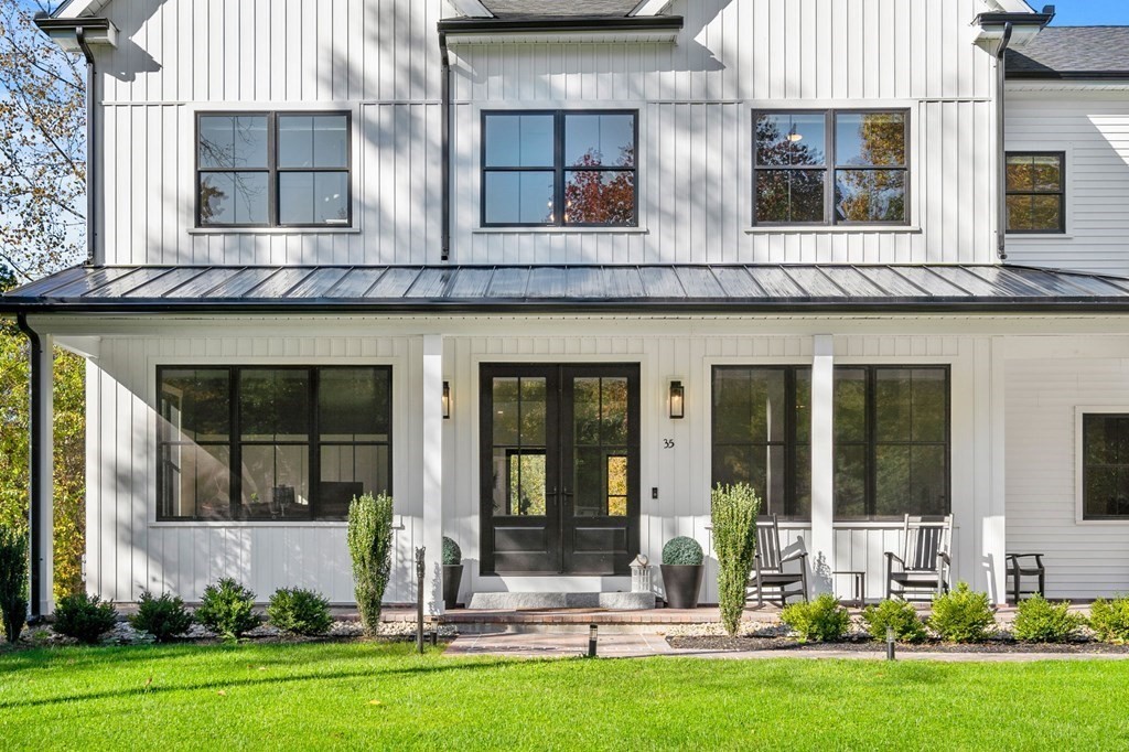 35 Hitching Post Road North Andover, MA 01845 - Photo 2 of 42 front view of house with a yard