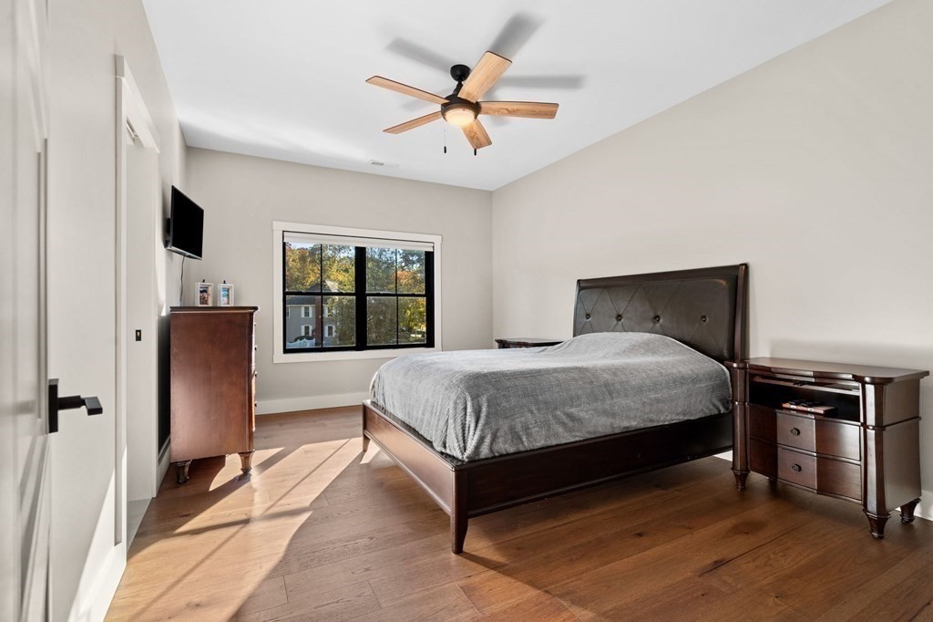 35 Hitching Post Road North Andover, MA 01845 - Photo 28 of 42 a spacious bedroom with a bed and a window