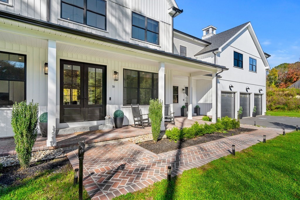 35 Hitching Post Road North Andover, MA 01845 - Photo 3 of 42 a front view of a house with garden and plants
