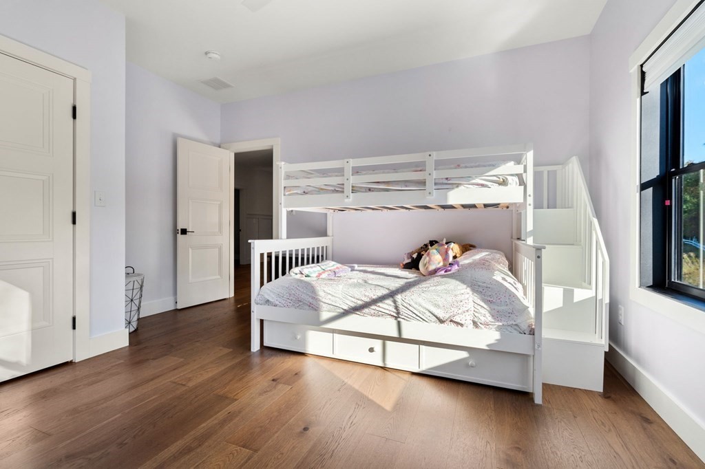 35 Hitching Post Road North Andover, MA 01845 - Photo 32 of 42 a bedroom with a bed and a flat screen tv