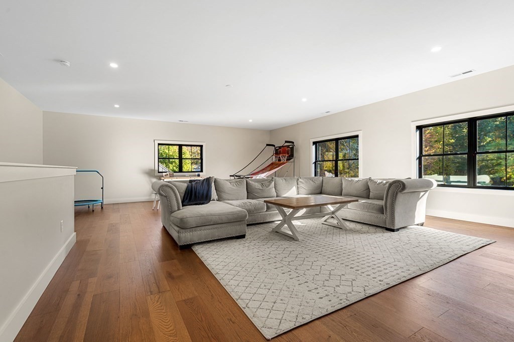 35 Hitching Post Road North Andover, MA 01845 - Photo 36 of 42 a living room with furniture wooden floor and windows