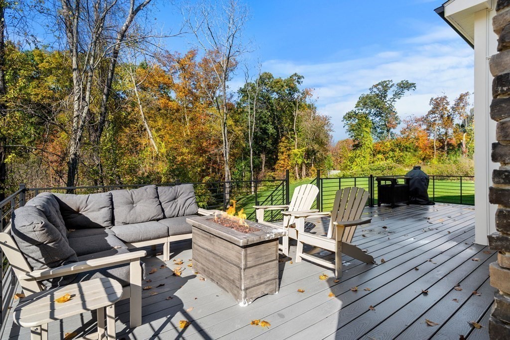 35 Hitching Post Road North Andover, MA 01845 - Photo 39 of 42 a view of a terrace with couches and wooden fence