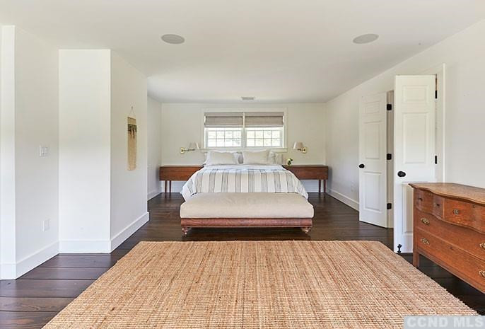160 Milan Hill Road Milan, NY 12571 - Photo 11 of 24 a spacious bedroom with a bed and wooden floor