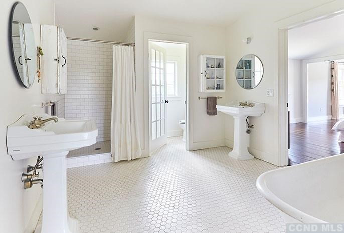 160 Milan Hill Road Milan, NY 12571 - Photo 14 of 24 a spacious bathroom with a bathtub shower and a sink