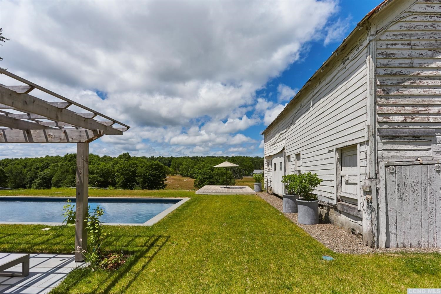 160 Milan Hill Road Milan, NY 12571 - Photo 17 of 24 a view of a swimming pool with a patio