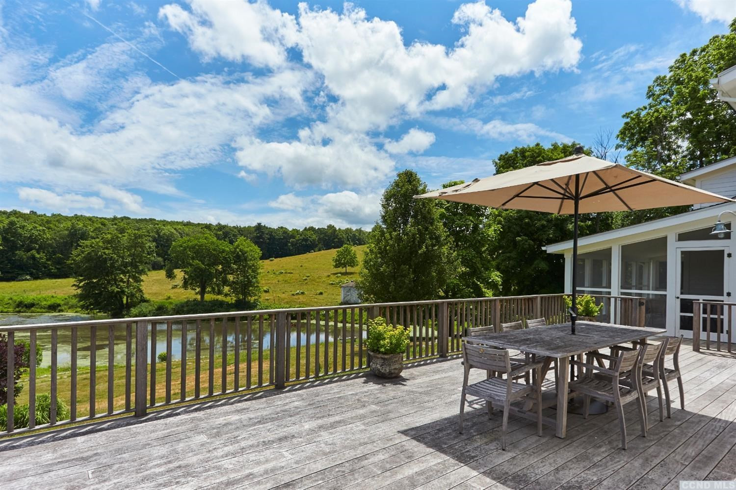 160 Milan Hill Road Milan, NY 12571 - Photo 21 of 24 an outdoor space with furniture and umbrella
