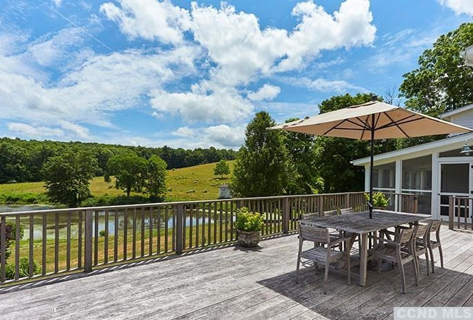160 Milan Hill Road Milan, NY 12571 - Photo 22 of 24 a view of a chair and table on the deck