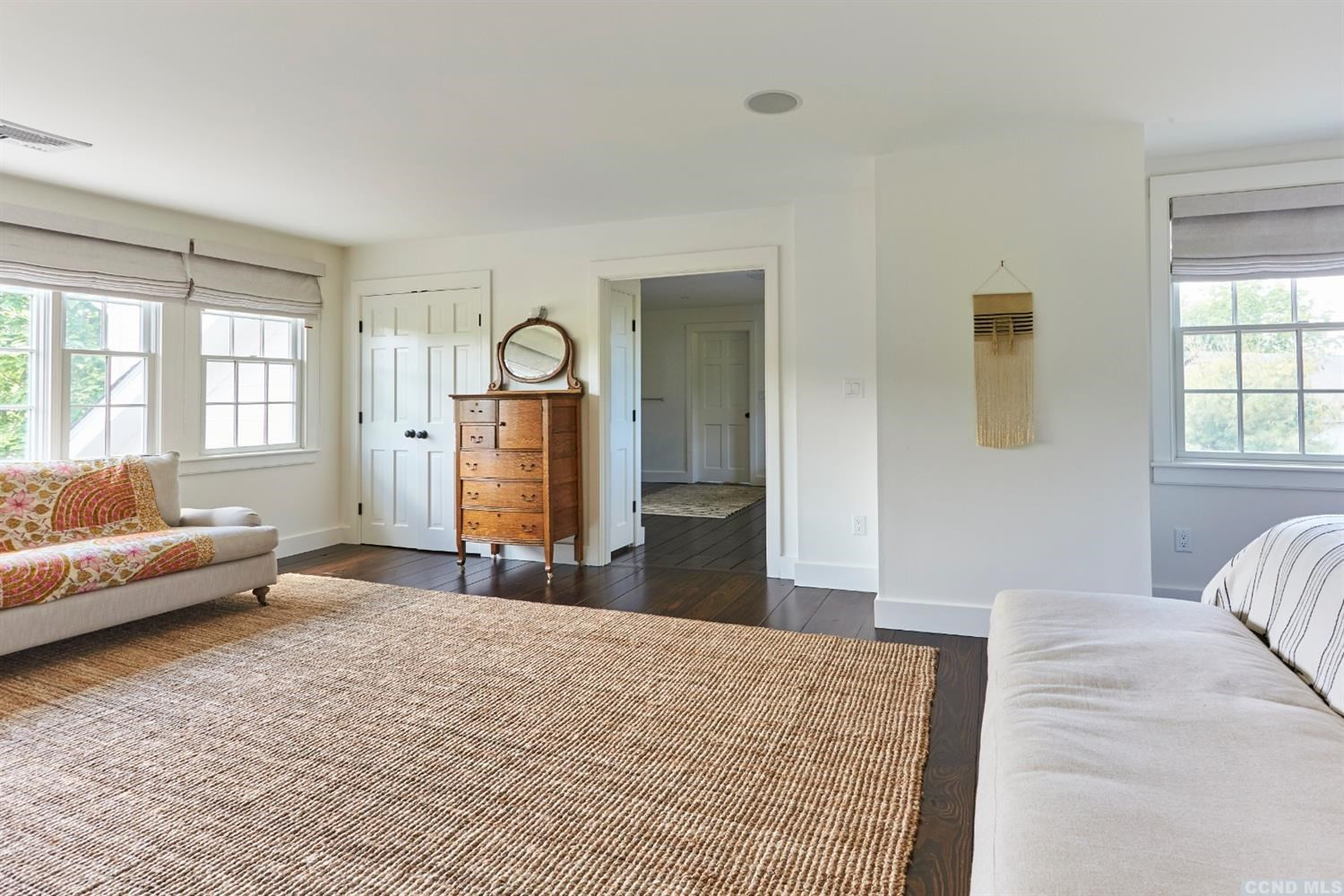160 Milan Hill Road Milan, NY 12571 - Photo 10 of 24 a bedroom with a bed and a couch with window