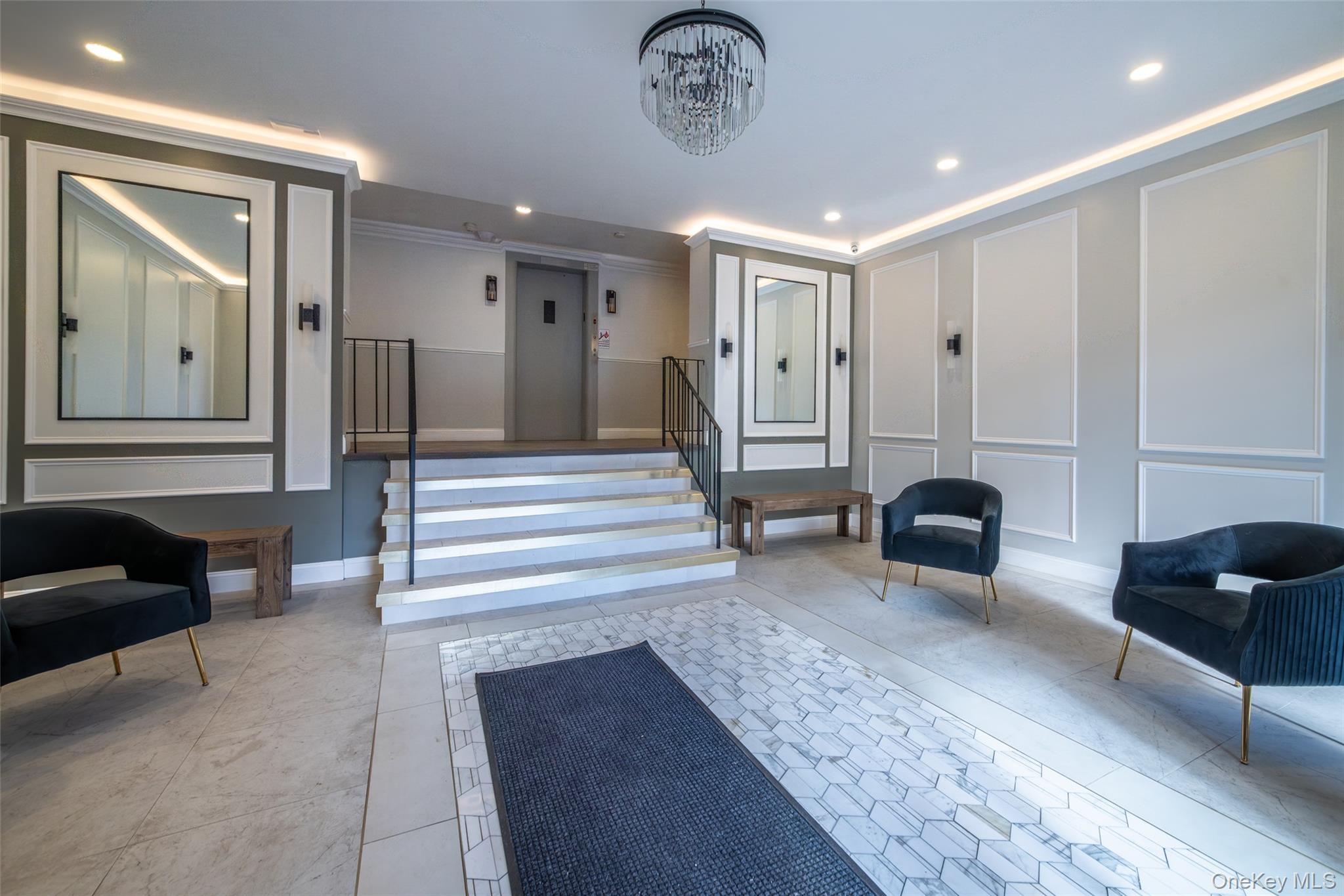 2221 Palmer Avenue, Unit 3D New Rochelle, NY 10801 - Photo 13 of 18 a living room with furniture and a chandelier