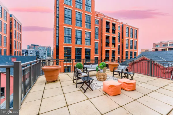 a outdoor space with the couches and coffee table