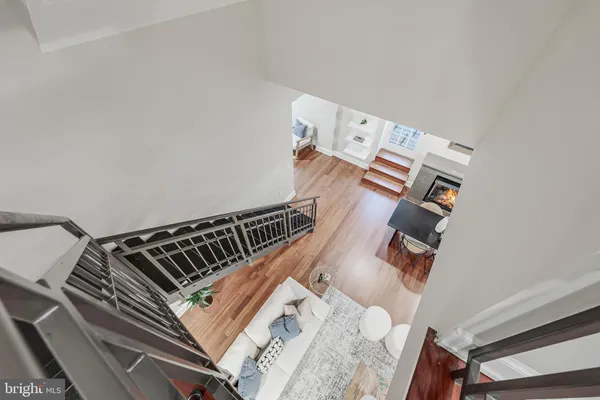 an aerial view of a bed and a couch