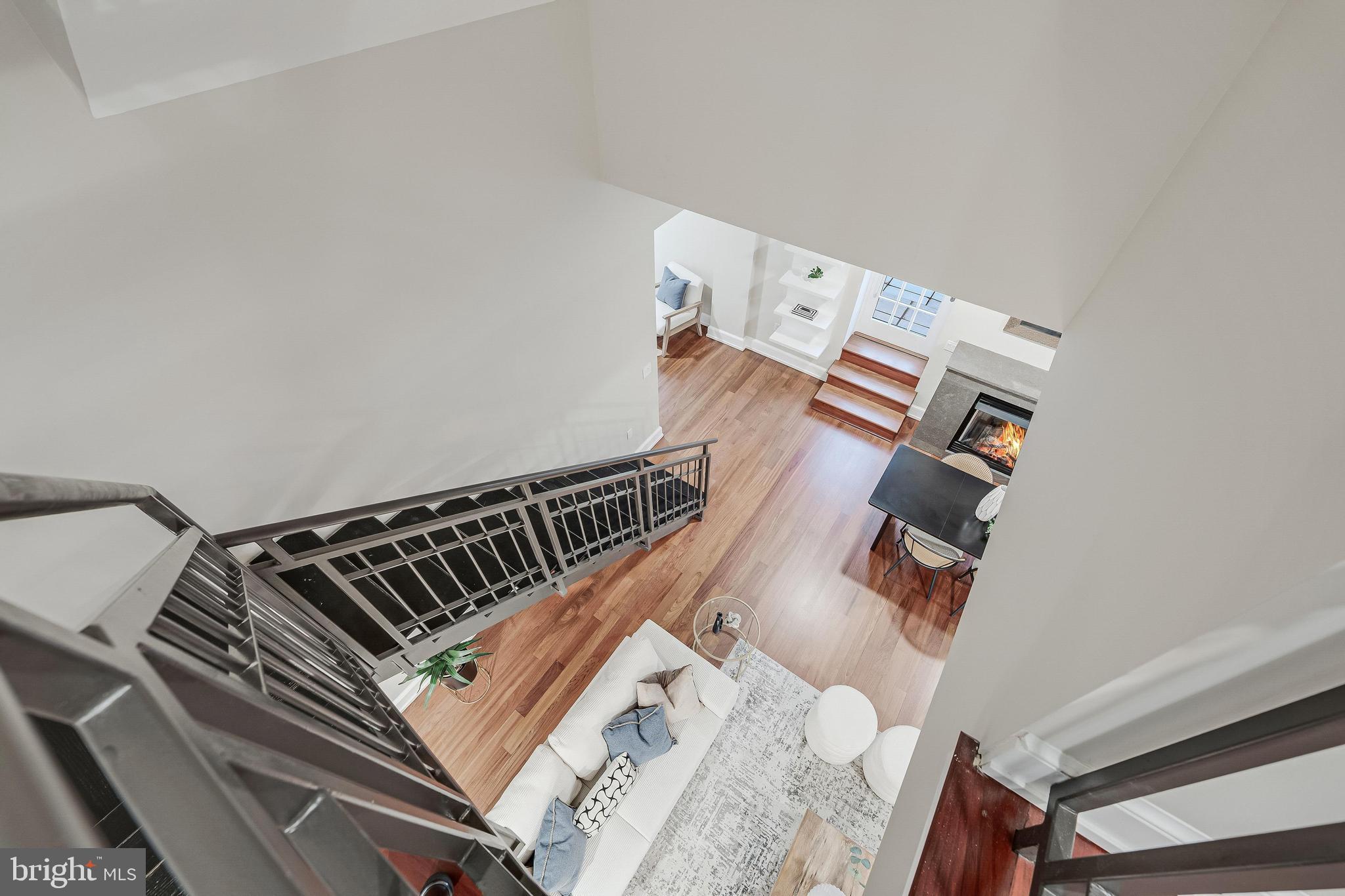 215 I Street Northeast, Unit 401 Washington, DC 20002 - Photo 22 of 36 an aerial view of a bed and a couch