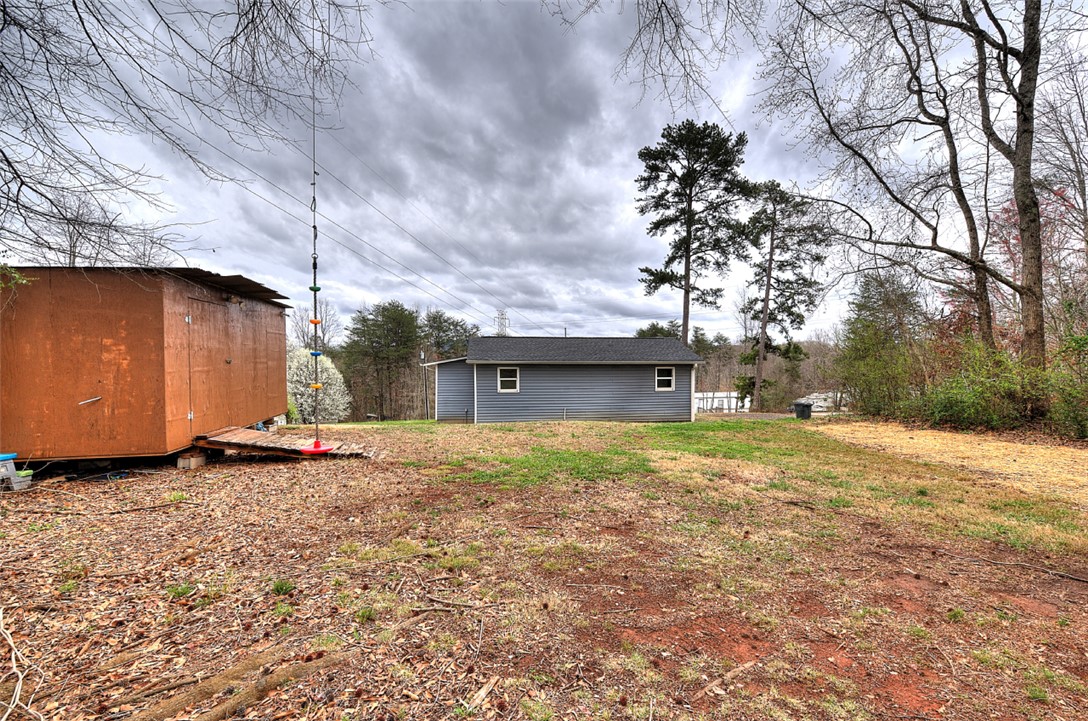 325 Rock Quarry Road Travelers Rest, SC 29690 - Photo 32 of 37 This property features a spacious yard and offers ample room for outdoor activities.