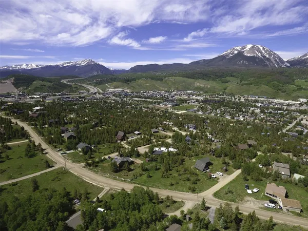 a view of a city with mountains in the background
