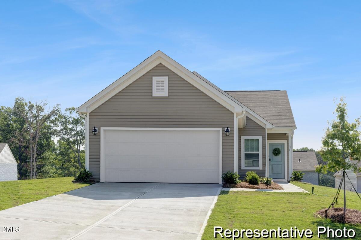 81 Cedarbranch Way, Unit 186P Dunn, NC 28334 - Photo 1 of 15 a view of a house with a yard