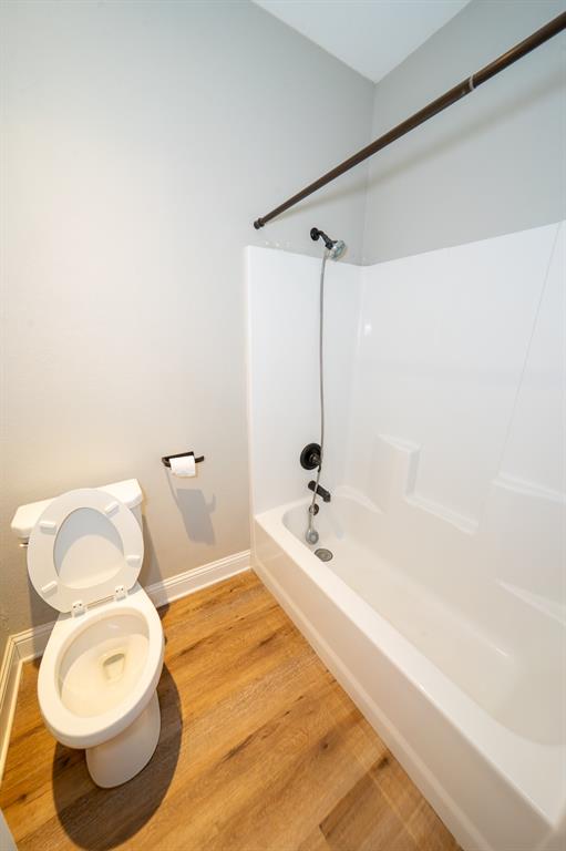 132 Addie Way Tuscola, TX 79562 - Photo 26 of 37 a bathroom with a toilet and a bathtub