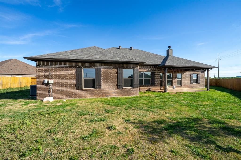 132 Addie Way Tuscola, TX 79562 - Photo 31 of 37 a front view of a house with a yard