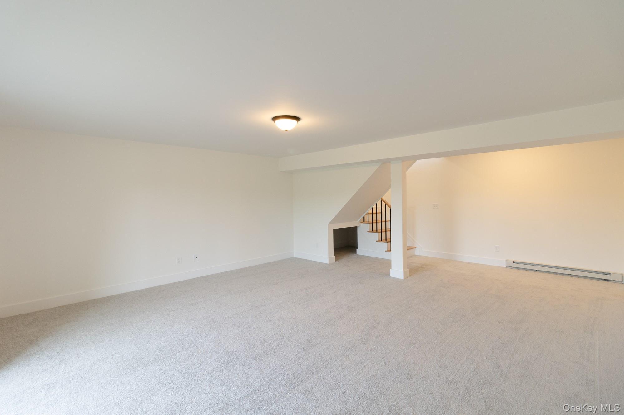 750 Ridgebury Road Slate Hill, NY 10973 - Photo 19 of 41 an empty room with windows