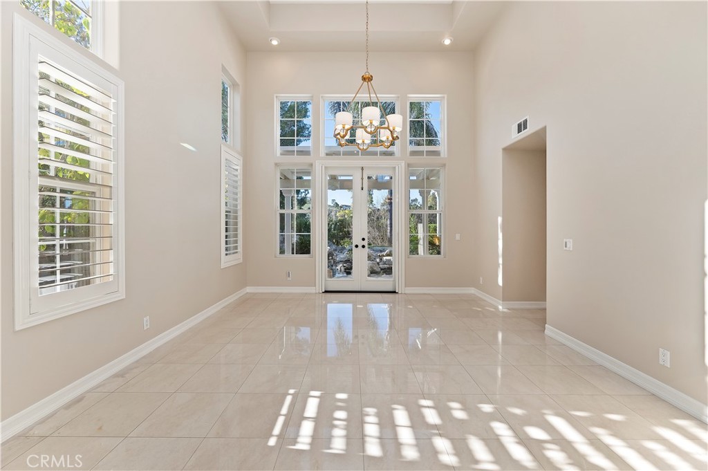 8 Nidden Irvine, CA 92603 - Photo 12 of 77 a view of an empty room with a window