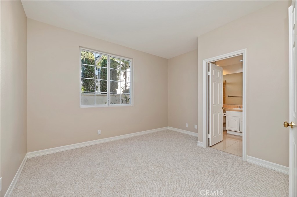 8 Nidden Irvine, CA 92603 - Photo 25 of 77 an empty room with windows and closet