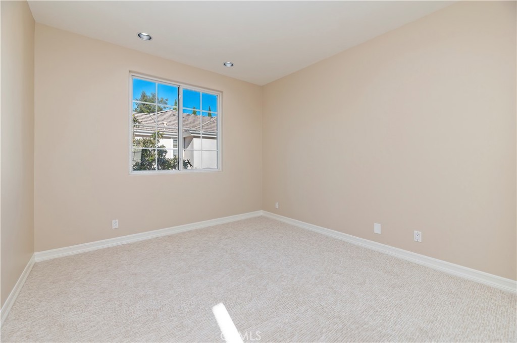 8 Nidden Irvine, CA 92603 - Photo 38 of 77 an empty room with windows