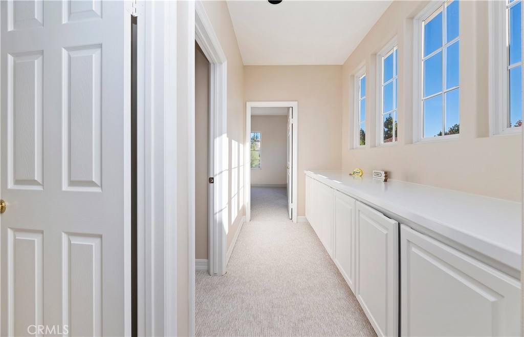 8 Nidden Irvine, CA 92603 - Photo 40 of 77 a view of a bathroom with a sink and a bath tub
