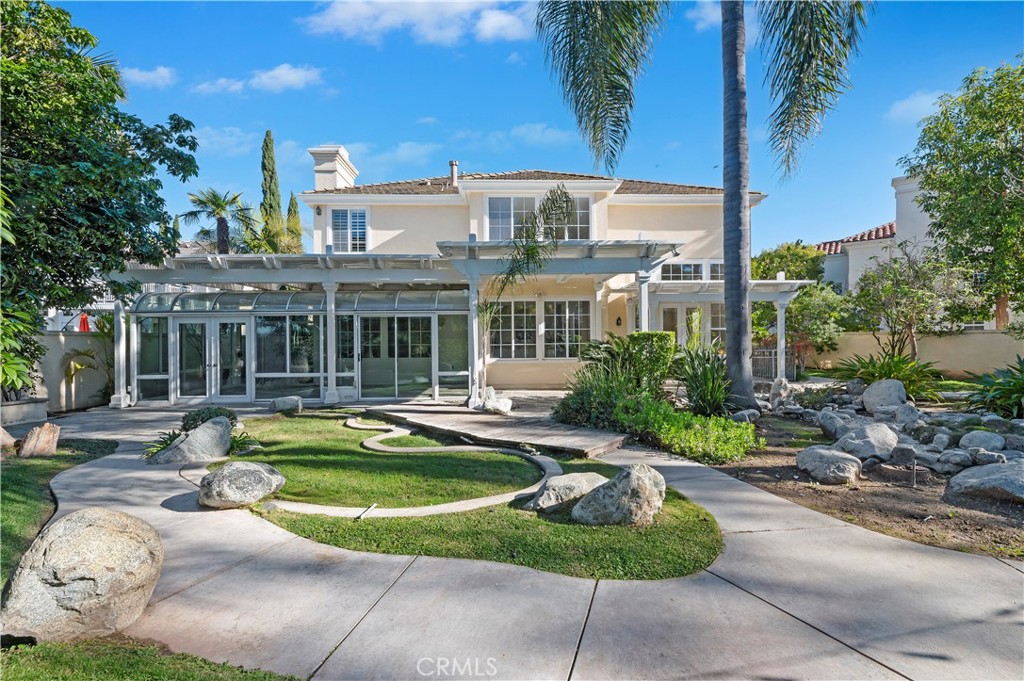 8 Nidden Irvine, CA 92603 - Photo 45 of 77 a view of a house with backyard swimming pool and sitting area