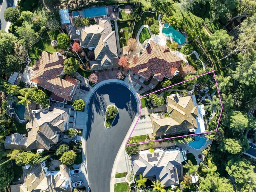 8 Nidden Irvine, CA 92603 - Photo 57 of 77 an aerial view of a house with a yard and garden