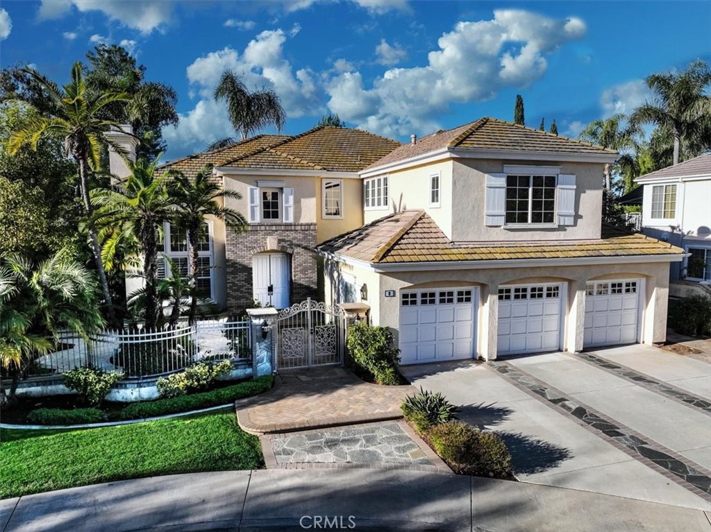 8 Nidden Irvine, CA 92603 - Photo 74 of 77 a front view of a house with a garden