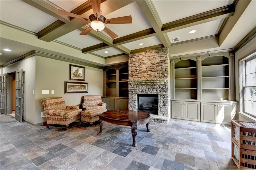 964 Fairview Club Circle Dacula, GA 30019 - Photo 31 of 47 a living room with furniture and a fireplace