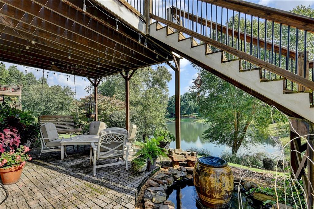 964 Fairview Club Circle Dacula, GA 30019 - Photo 35 of 47 a view of chairs and potted on the roof deck