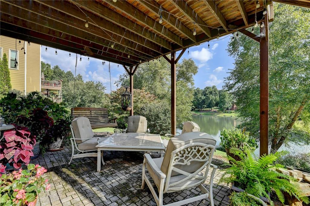 964 Fairview Club Circle Dacula, GA 30019 - Photo 36 of 47 a view of chairs and table in patio