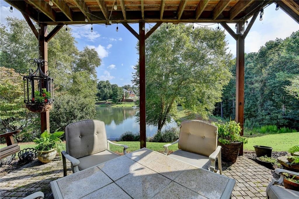 964 Fairview Club Circle Dacula, GA 30019 - Photo 37 of 47 a view of backyard with outdoor seating and plants