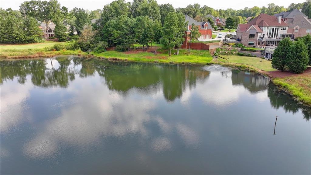 964 Fairview Club Circle Dacula, GA 30019 - Photo 44 of 47 a view of residential house with outdoor space and lake
